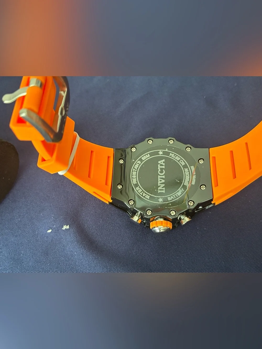 Invicta chronograph visible